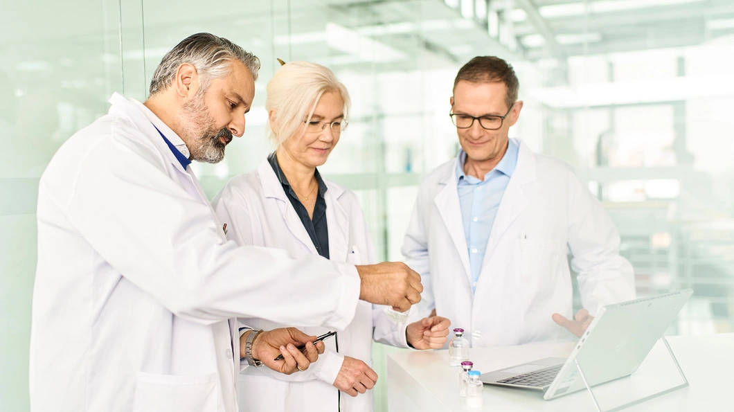 Team of researchers, looking at findings